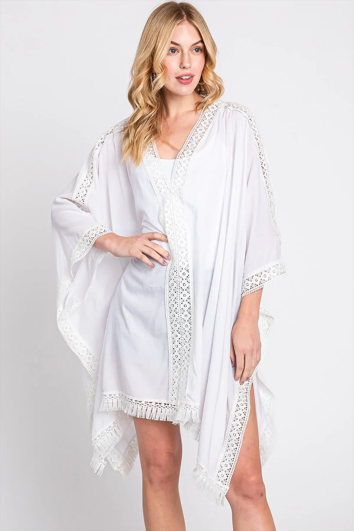 AZTEC LACE TRIM DETAIL PONCHO WITH TASSEL