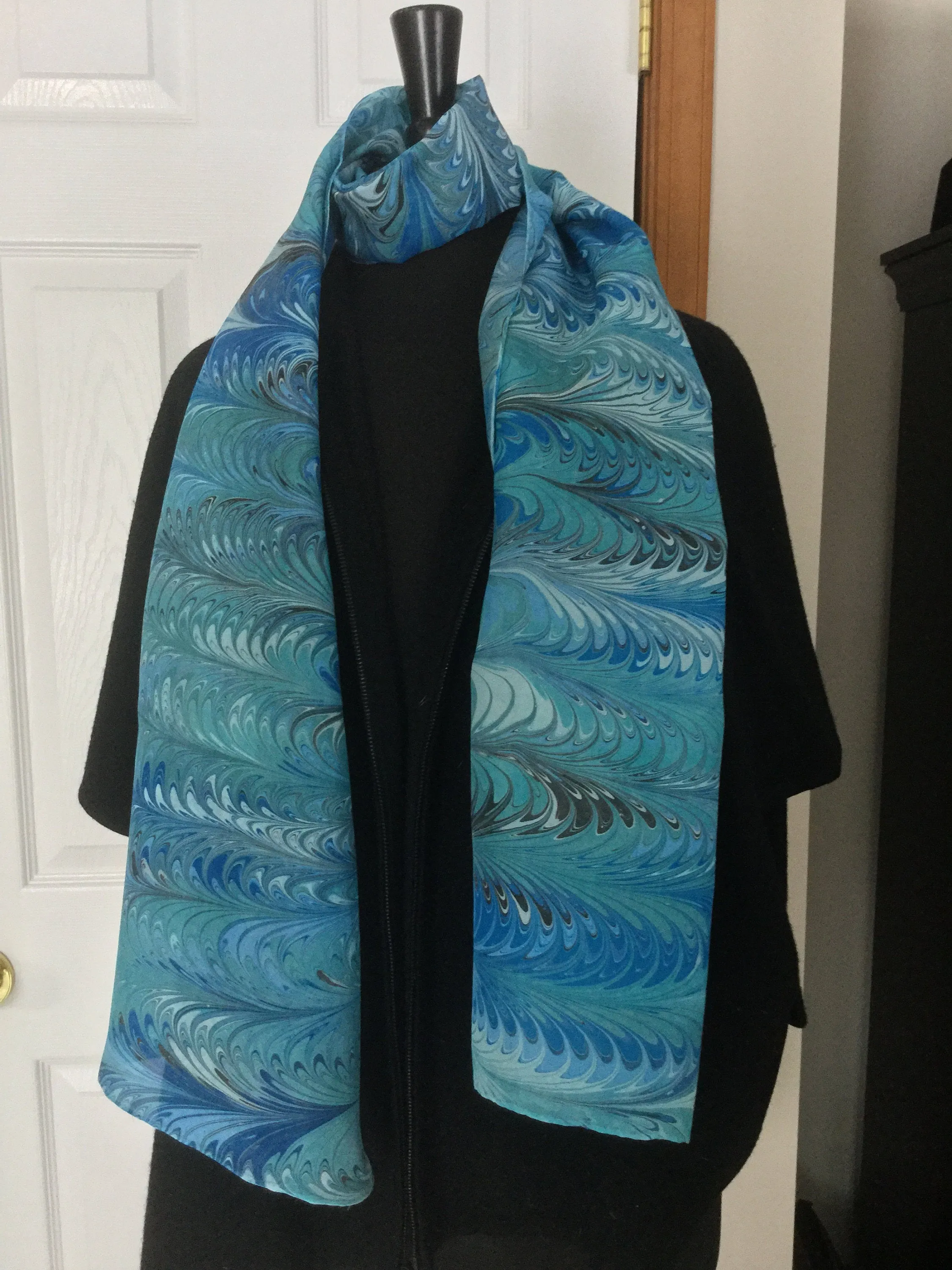 Blue feather  water marbled 8mm Habotai silk.  Hang on the wall, use as a table runner or wear this unique piece