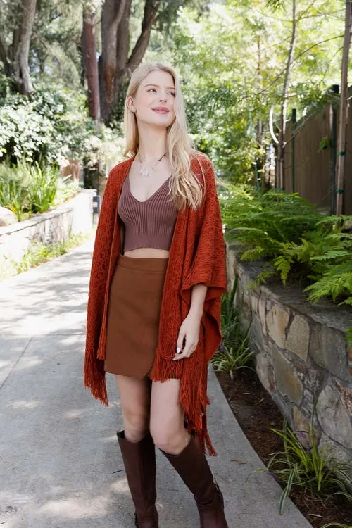 Embroidered Tassel Ponchos.