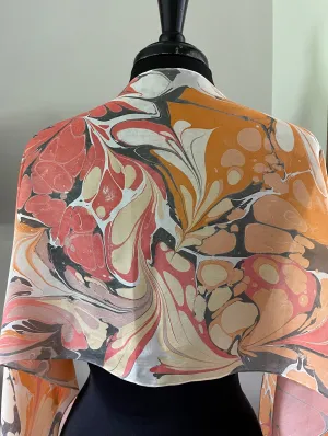 Orange very random water marbled 8mm Habotai silk.  Hang on the wall, use as a table runner or wear this unique piece