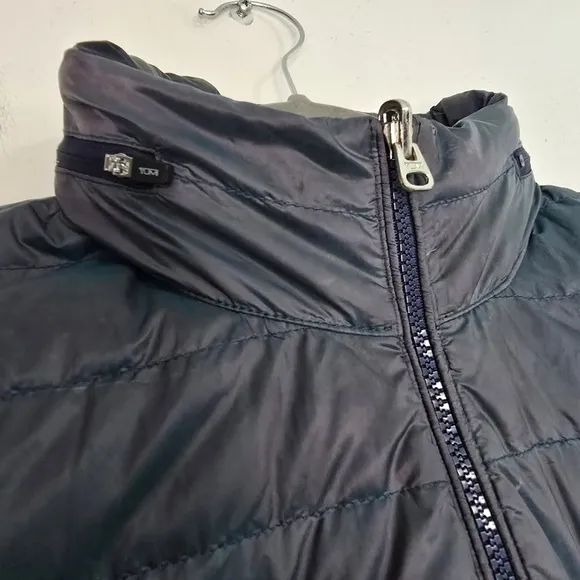 Tumi Core Pax Nylon Puffer Jacket in Chameleon green 80% down 20% feathers