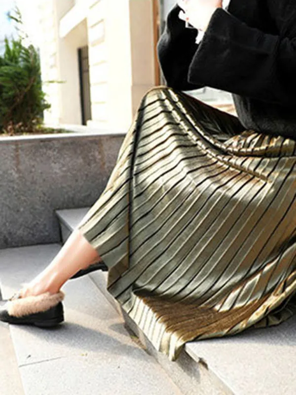 Women's gold velvet pleated skirt with wide hem